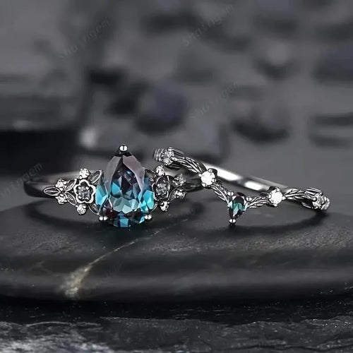2-Piece Set: Gothic Black & Golden Engagement Ring Set with Pear-Shaped Cubic Zirconia by DailySale
