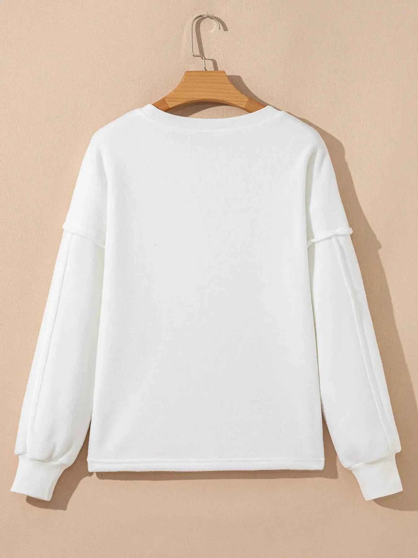 Cozy Cream Exposed Seam Knit Pocket Pullover Sweatshirt