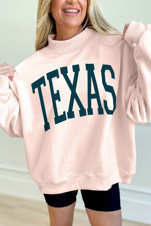 Apricot Pink TEXAS Letter Printed Mock Neck Baggy Sweatshirt by Wild and Free Boutique