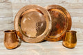 2 Mexican Copper Charger Plates with 2 Copper Cups 2 Platos de Cobre Mexicano con 2 Vasos de Cobre by Chica Mexico