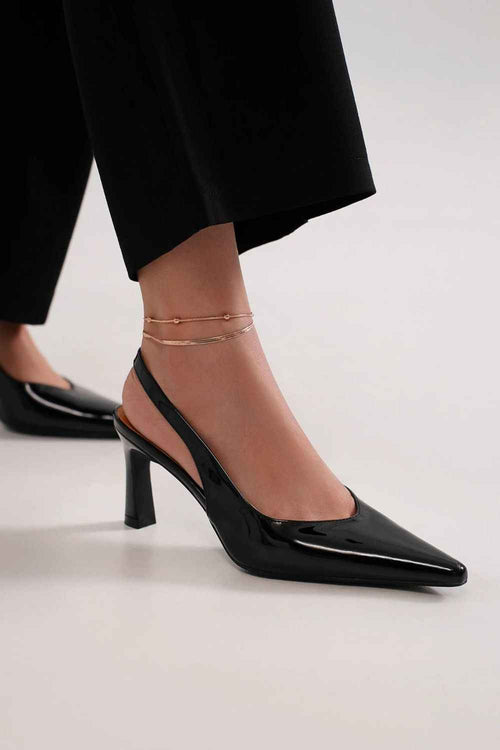 Beast Fashion Faux Leather Point Toe Slingback Pumps by Wild and Free Boutique