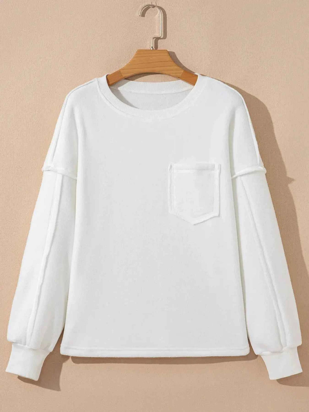 Cozy Cream Exposed Seam Knit Pocket Pullover Sweatshirt