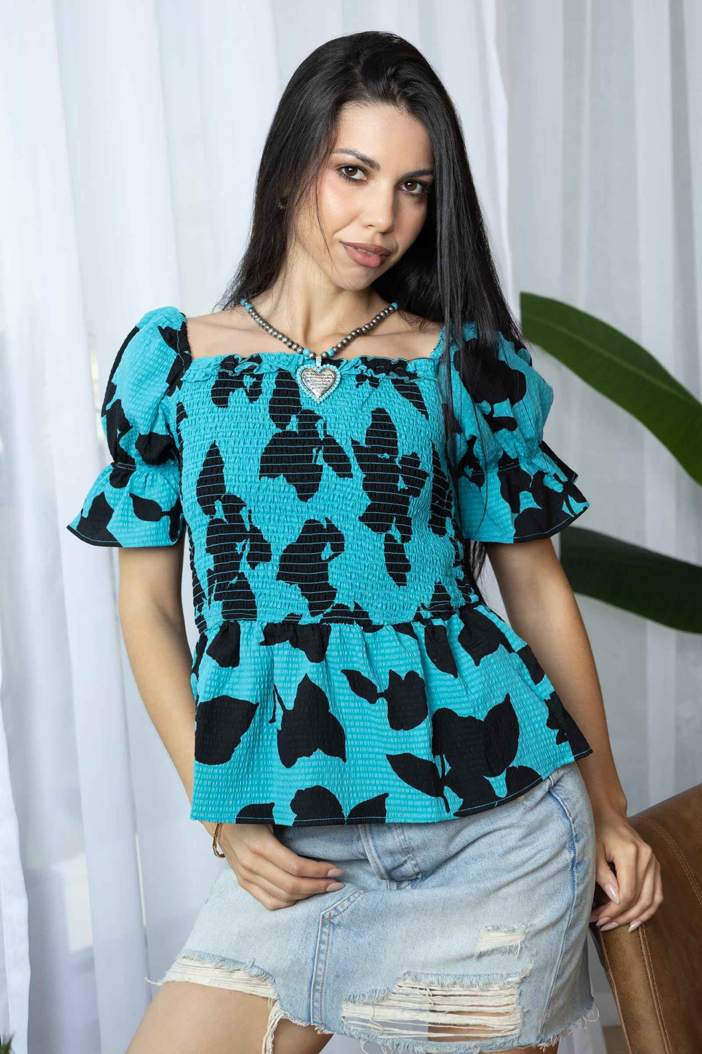 Bailey in Bold Peplum Top In Blue And Black