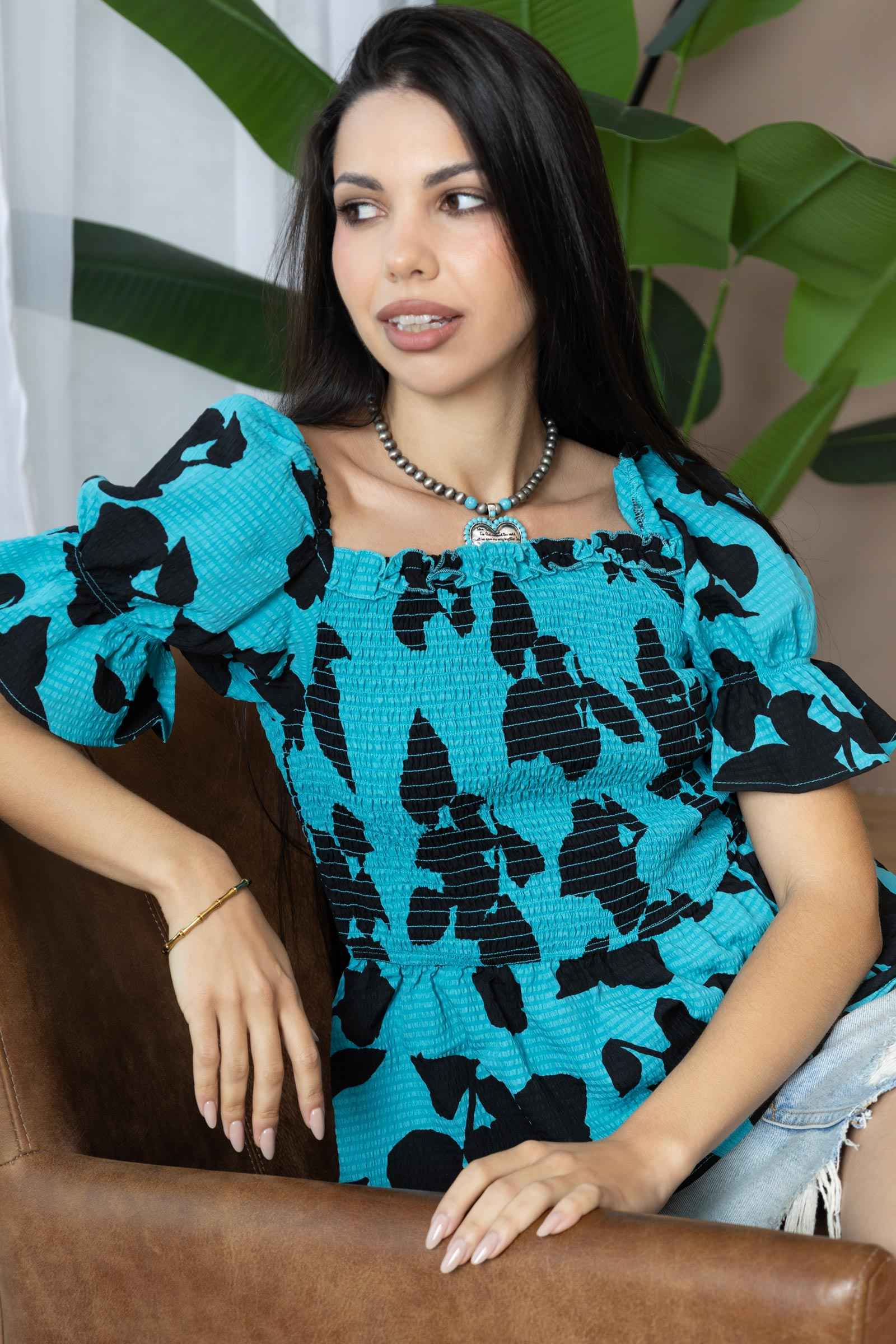 Bailey in Bold Peplum Top In Blue And Black