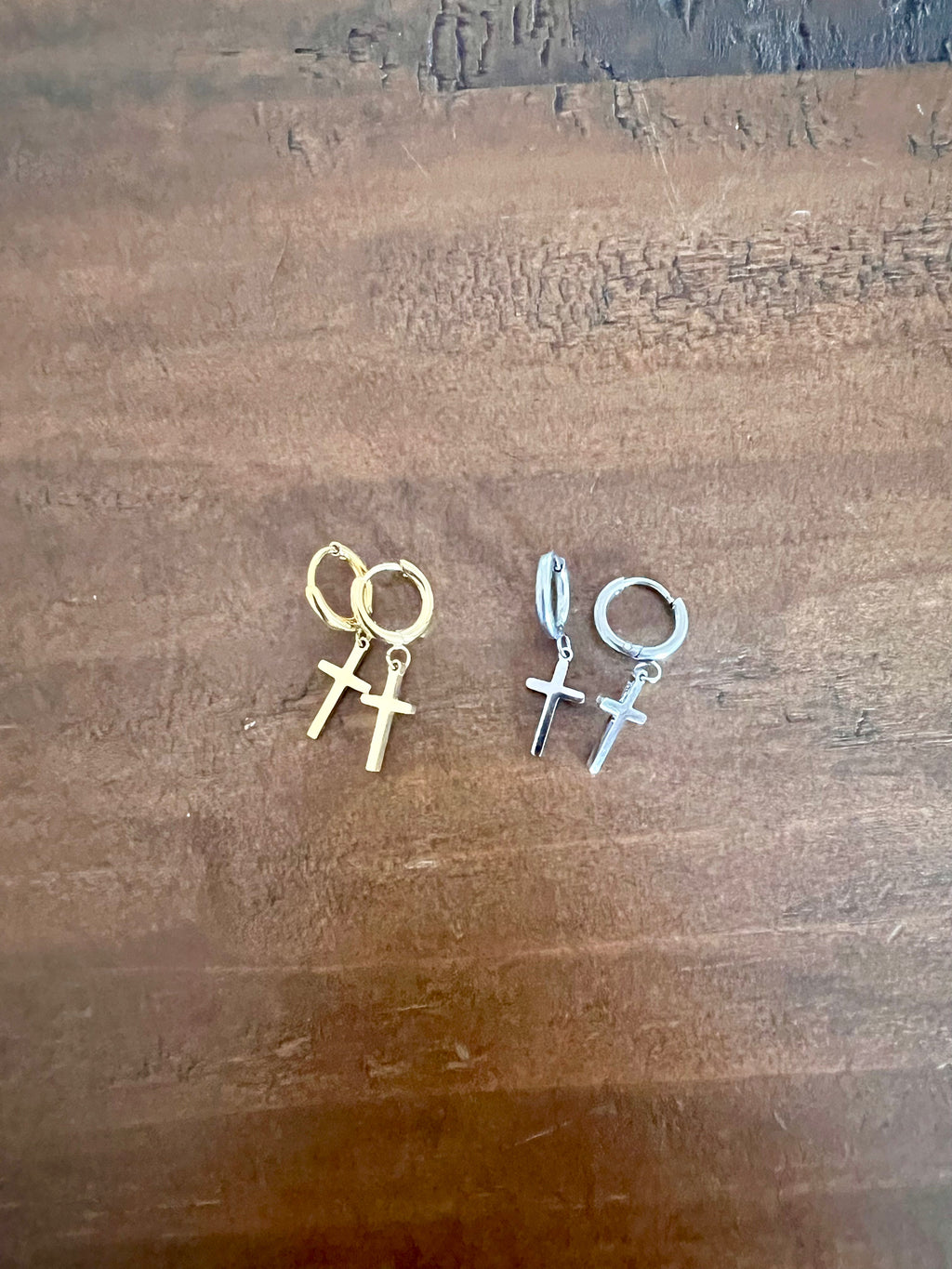 cross huggie earrings
