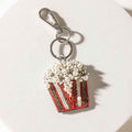 Lights, Camera, Pop! Keychain in Cherry Shine