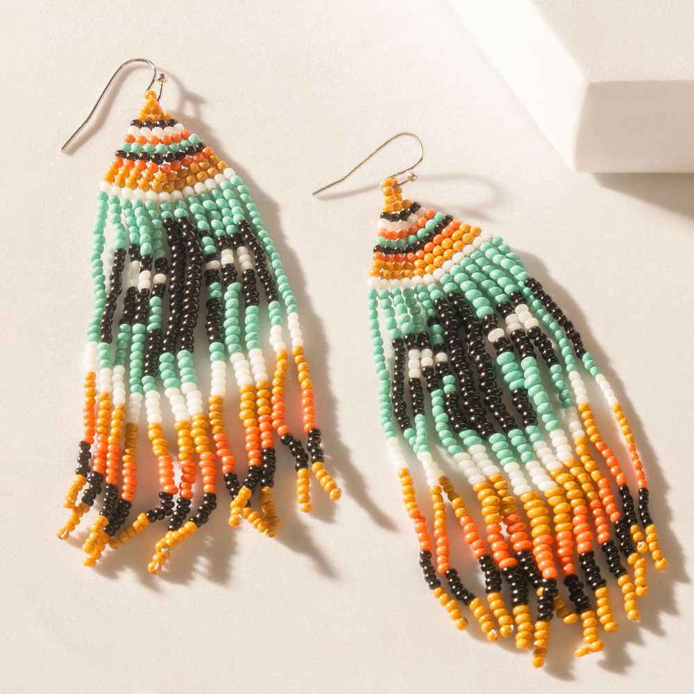 Myra The Eagle Spoke Earrings in Sunny Teal