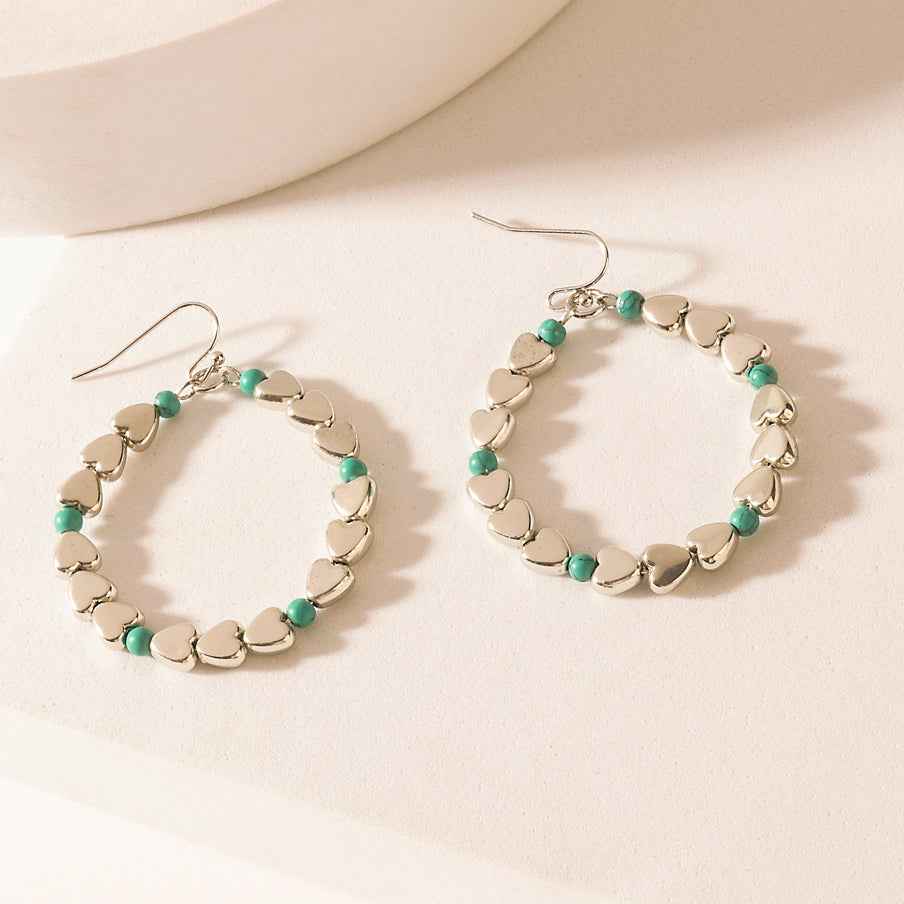 Myra Trail of Hearts Hoop Earrings in Arctic Silver