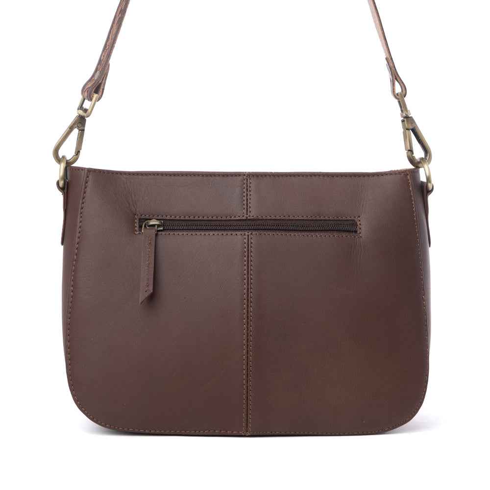 Myra Copper Crest Handtooled Hairon Leather Clutch in Saddle Walnut