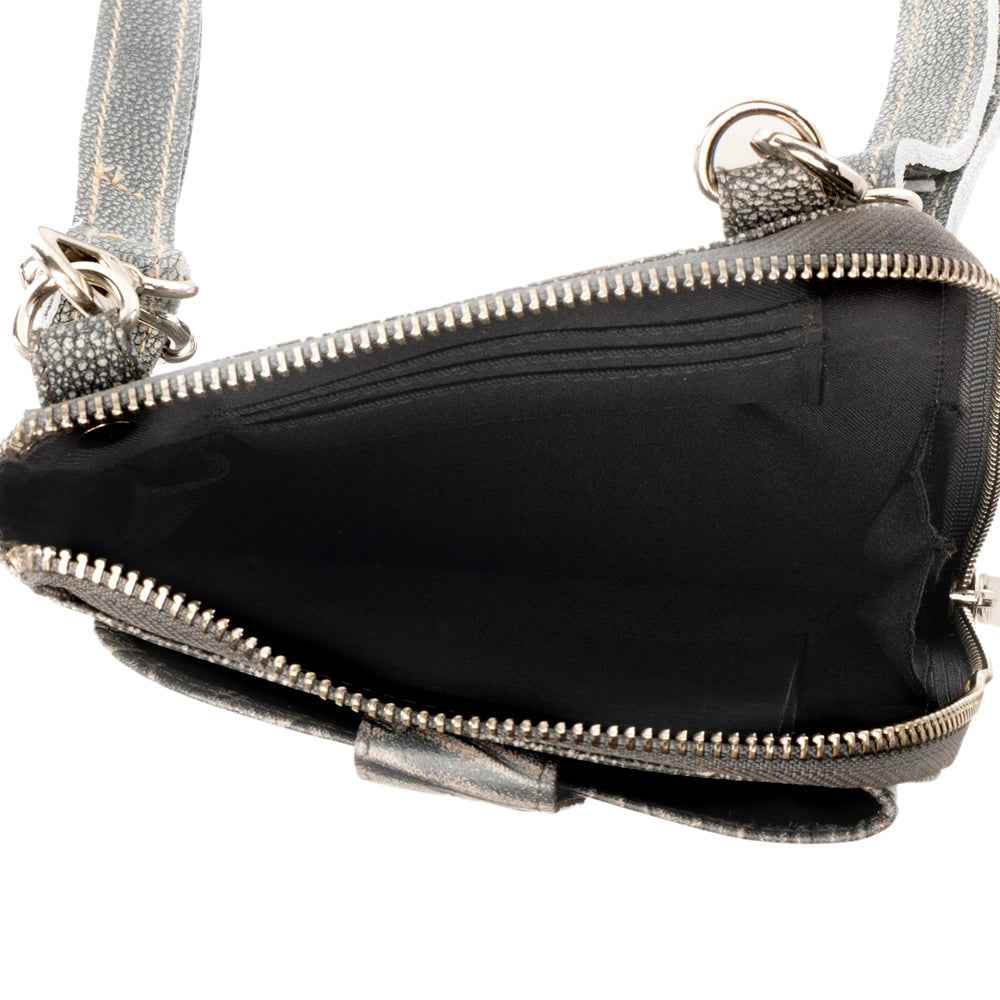 Myra Coyote Bloom Embossed mini sling for Women in sage with floral detail