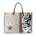 Myra Wildstar Pony Western Weekender Bag for Women in white with hairon detail