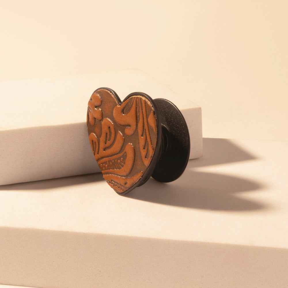 Myra Cowgirl Heart Phone Socket for Women in brown with handtooled detail for everyday use