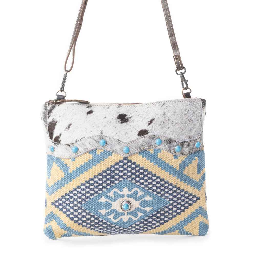 Myra Tufts Pattern Woven Hairon Crossbody â€“ Tribal Geometric Print with Leather Strap and Studded Accents