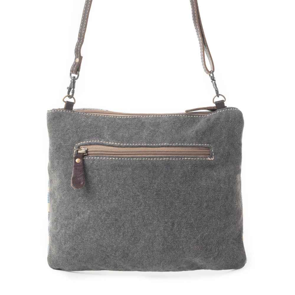 Myra Tufts Pattern Woven Hairon Crossbody â€“ Tribal Geometric Print with Leather Strap and Studded Accents