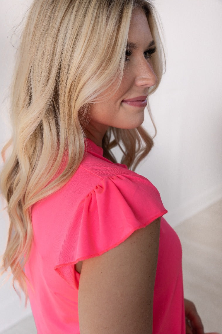 The Nicole V-Neck Top, Neon Pink by Grace+Emma
