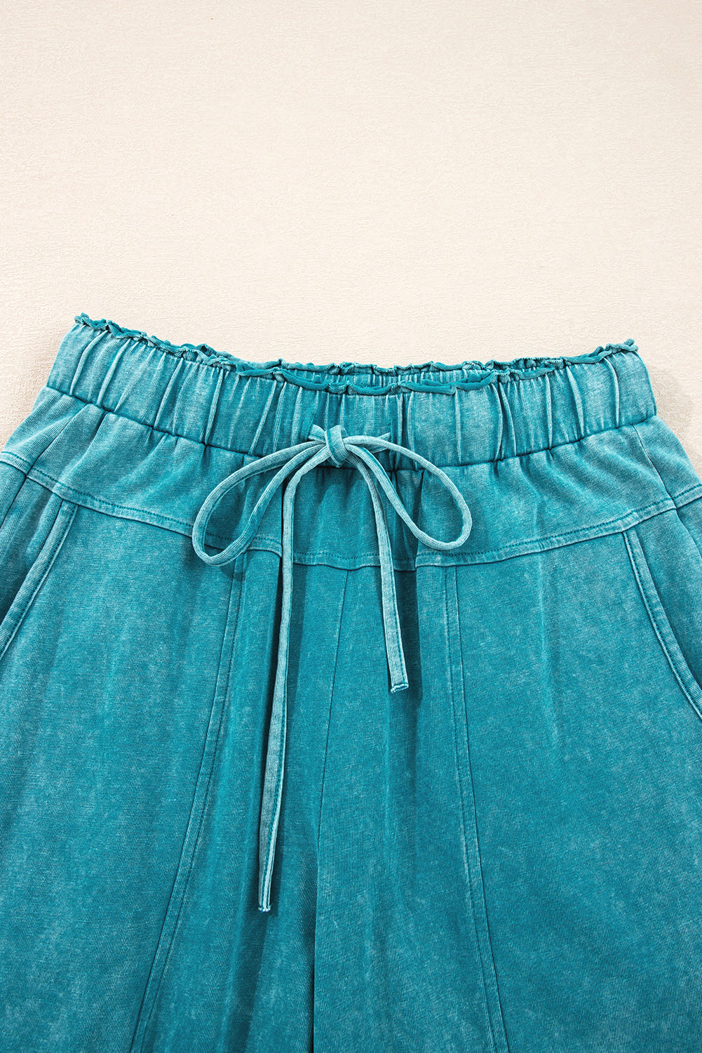 Wild Ginger  Mineral Wash Knot High Waist Raw Hem Pants